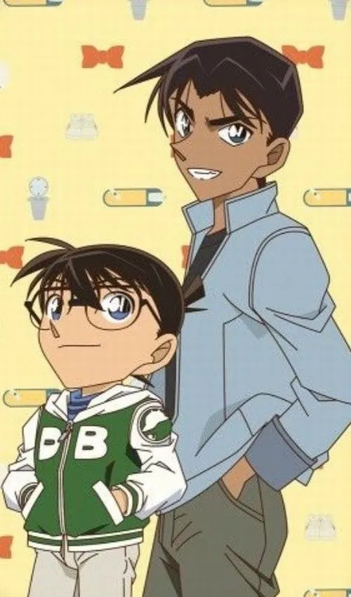hinh-anh-hattori-heiji-ngau-60 Ảnh bìa Hattori bên Conan nhỏ, nền vàng nhẹ, cảm giác tuổi học trò và đồng đội phá án.